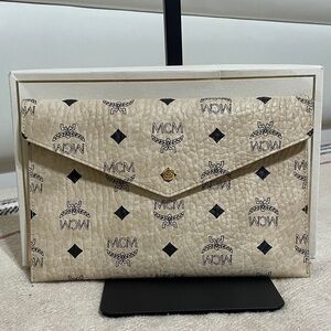 MCM Novelty Item Cream and Black Logo Clutch